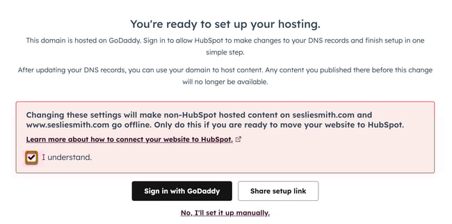 The domain connection page is displayed to configure DNS records. A box is placed around the 'I Understand' checkbox to confirm settings. Two buttons appear 'Sign in with GoDaddy'' and 'Share setup link'. Hyperlinked text is visible 'No I'll set it up manually'.